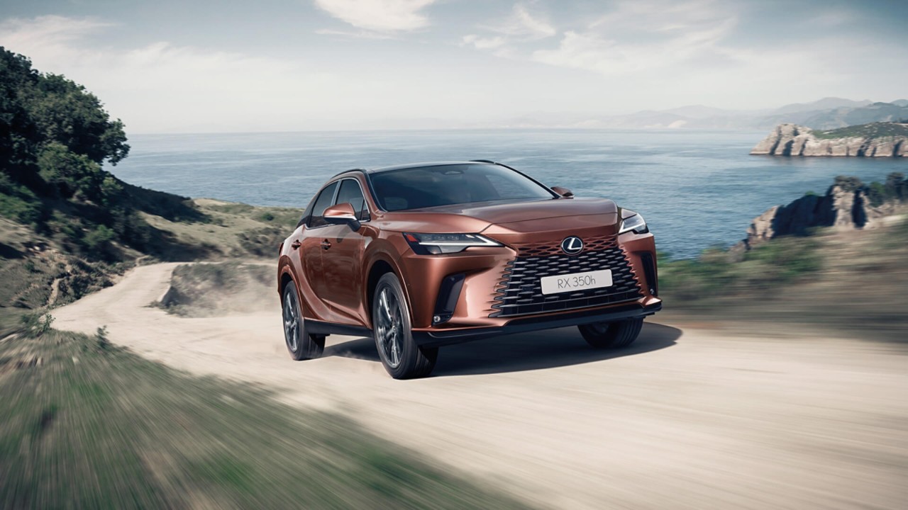 Lexus RX 350h driving up a coastal track