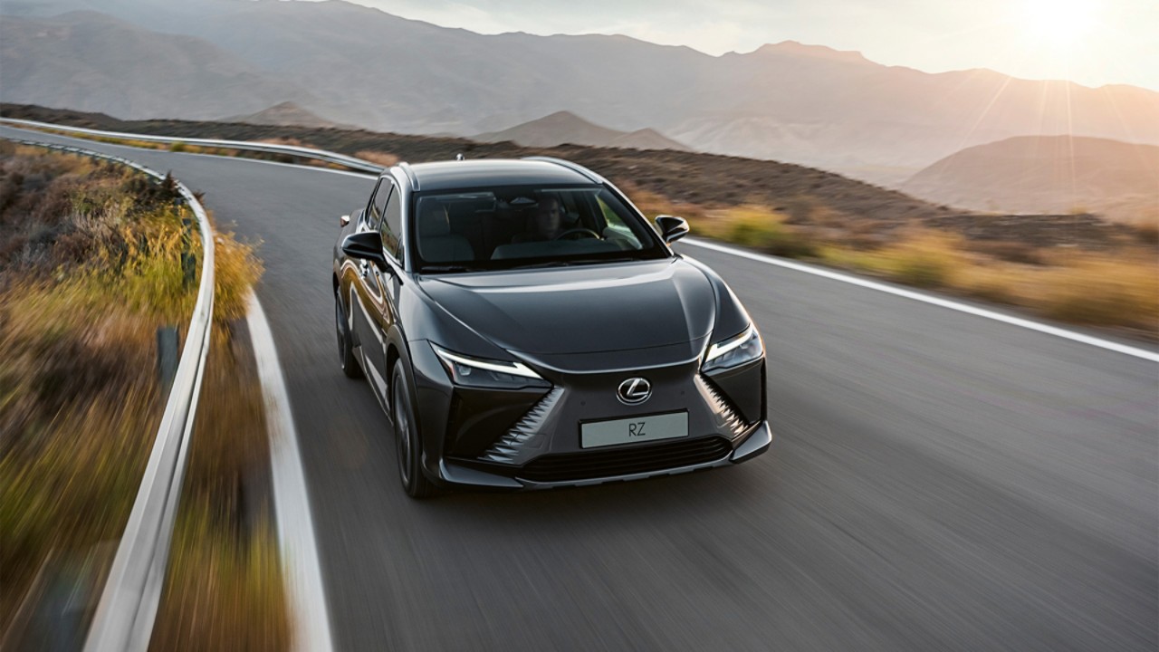 Front view of a Lexus RZ 450e parked in a rural location